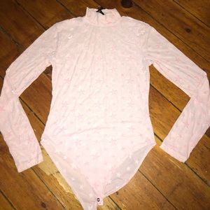 Pink star print body suit